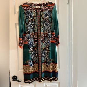 Green and floral design dress. Size 8. Worn once.No flaws.